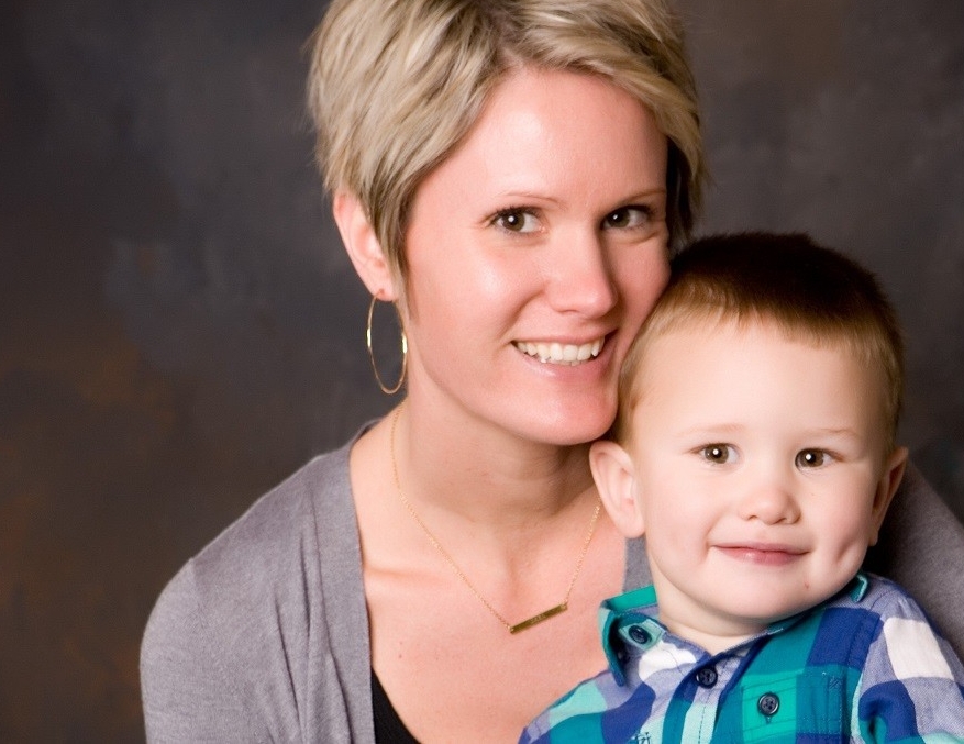 Heather Bennett holding her toddler son.