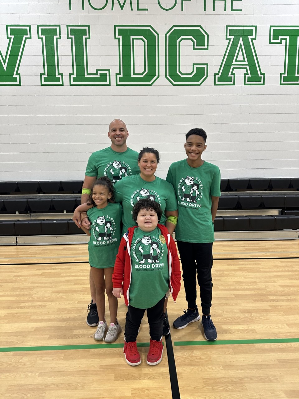 Ollie with his family at his blood drive