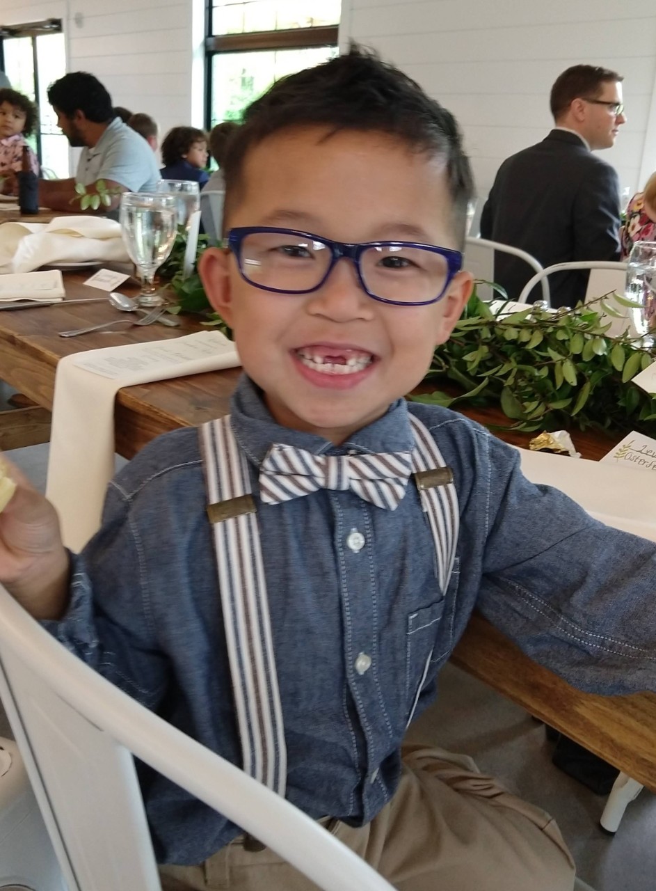 Levi Osterfeld wearing a bow tie and suspenders