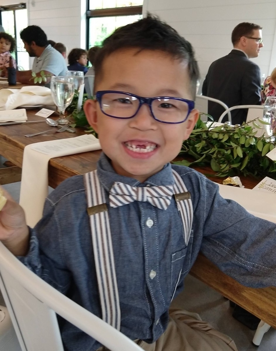 Levi Osterfeld wearing a bow tie and suspenders