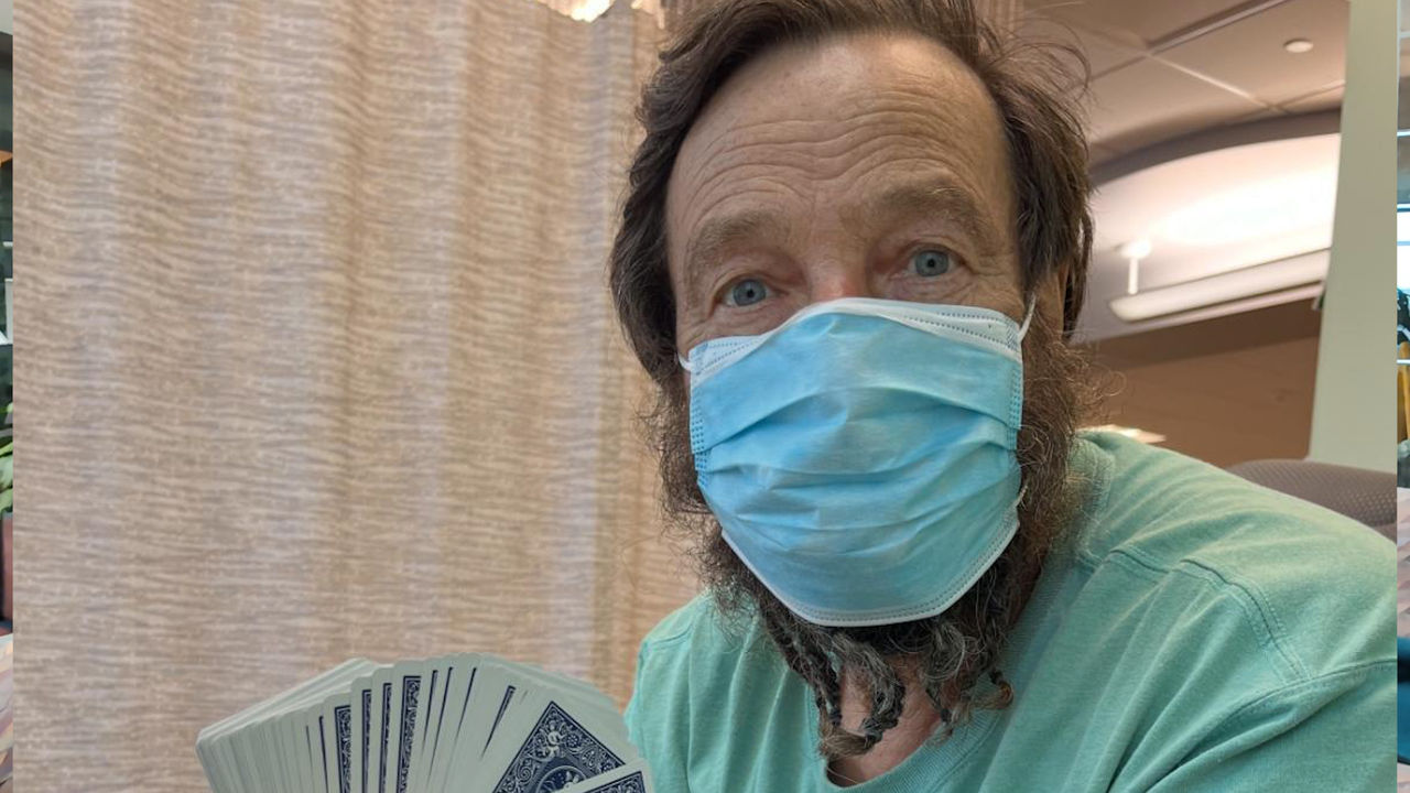 Richard playing cards in the hospital